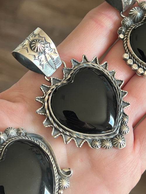 Apache Sterling Silver and Black Onyx Heart Pendants by Rosella Paxson