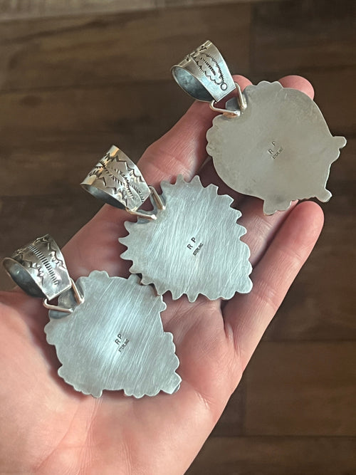 Apache Sterling Silver and Black Onyx Heart Pendants by Rosella Paxson