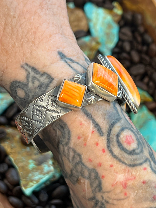 Handcrafted Sterling Silver and Orange Spiny Oyster Shell Geometric Row Cuff by Rosella Paxson