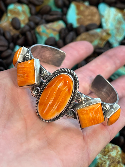 Handcrafted Sterling Silver and Orange Spiny Oyster Shell Geometric Row Cuff by Rosella Paxson