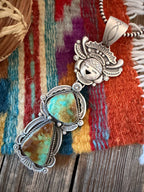 Handcrafted Sterling Silver and Number 8 Turquoise Kachina Pendant by Ronald Tom