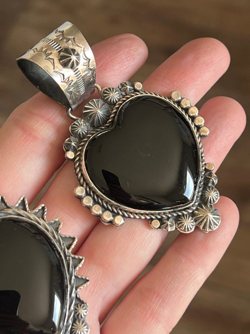 Apache Sterling Silver and Black Onyx Heart Pendants by Rosella Paxson