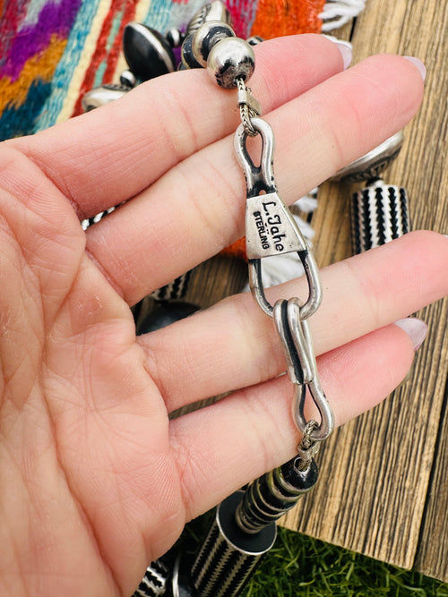 Hand Stamped Sterling Silver Beaded 28” Necklace by Leander Tahe