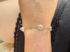 “The Golden Collection” Handmade White Beaded Plated Flower Bracelet