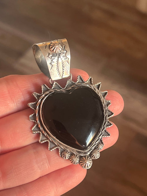 Apache Sterling Silver and Black Onyx Heart Pendants by Rosella Paxson
