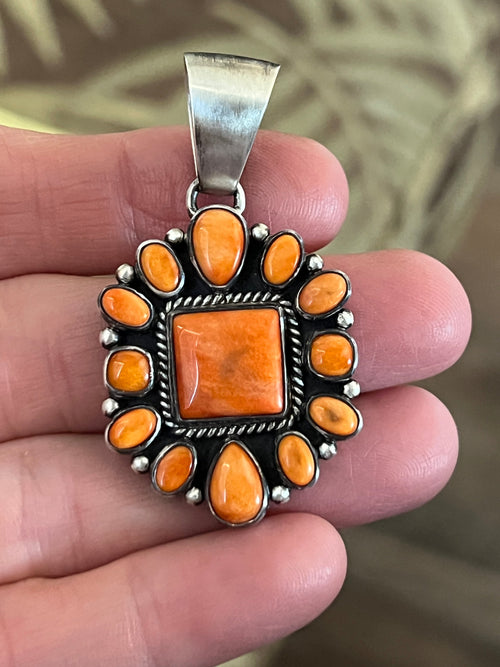 Handcrafted Sterling Silver and Burnt Spiny Oyster Shell Cluster Pendants by Loretta Delgarito