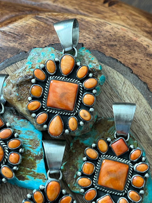 Handcrafted Sterling Silver and Burnt Spiny Oyster Shell Cluster Pendants by Loretta Delgarito