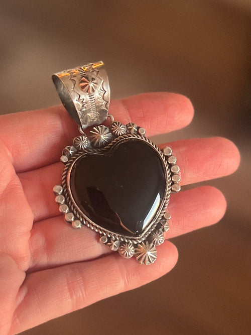 Apache Sterling Silver and Black Onyx Heart Pendants by Rosella Paxson