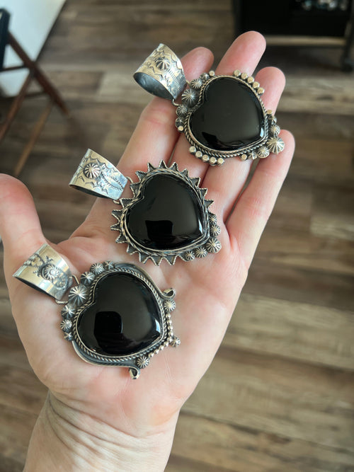 Apache Sterling Silver and Black Onyx Heart Pendants by Rosella Paxson
