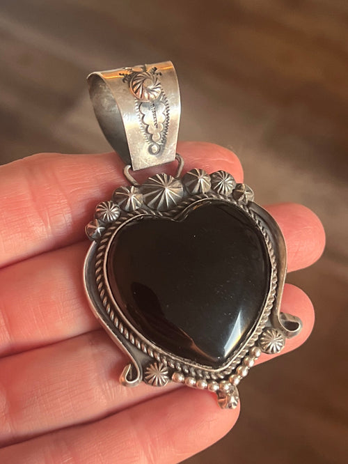 Apache Sterling Silver and Black Onyx Heart Pendants by Rosella Paxson