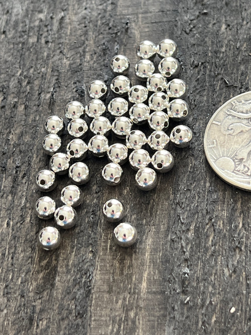 25 Bright Sterling Silver Machine Made Seamless Round Beads, 6mm