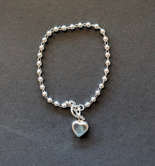 Sterling Silver Beaded Chain Bracelet With Dangling Heart