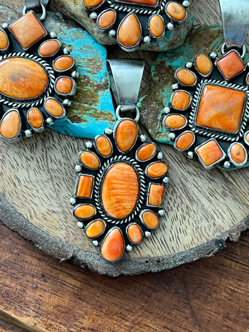 Handcrafted Sterling Silver and Burnt Spiny Oyster Shell Cluster Pendants by Loretta Delgarito