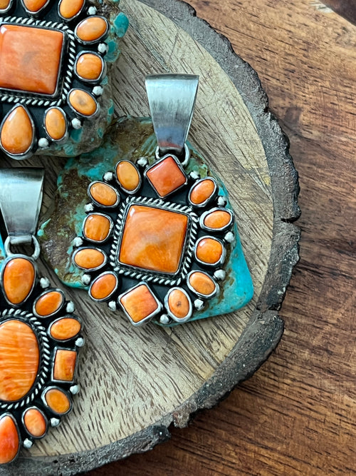 Handcrafted Sterling Silver and Burnt Spiny Oyster Shell Cluster Pendants by Loretta Delgarito