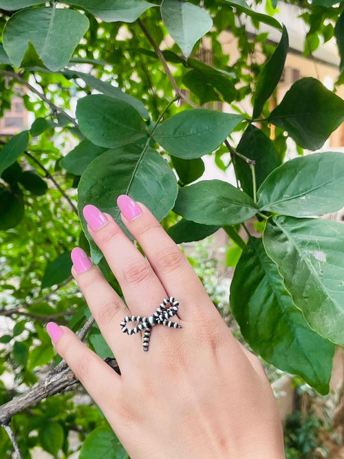 The Sterling Silver Bow Tie Handmade Sterling Silver Navajo Pearl Style Beaded Stretch Ring