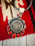 Handcrafted Sterling Silver and Coral Liberty Coin Pendant by Randy Boyd