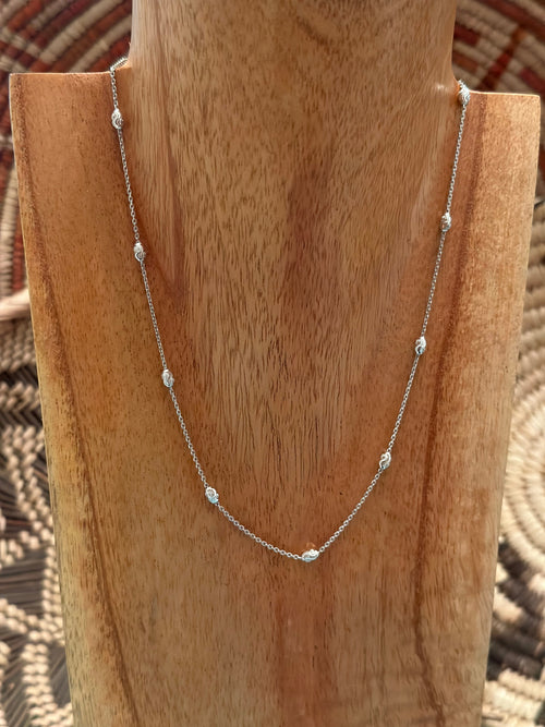 The Radiant Cascade Sterling Silver Diamond Cut Bead Necklace 16 Inch