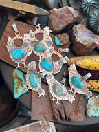 The Nizhoni Cluckers: Hand Stamped and Layered Sterling Silver, Brass, Copper & Kingman Turquoise Chicken Pendants by Kimari Somers