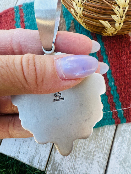 Handcrafted Sterling Silver and Coral Liberty Coin Pendant by Randy Boyd