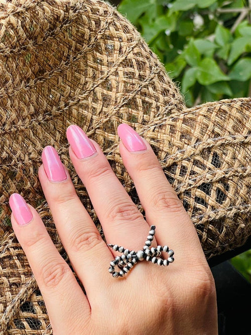 The Sterling Silver Bow Tie Handmade Sterling Silver Navajo Pearl Style Beaded Stretch Ring