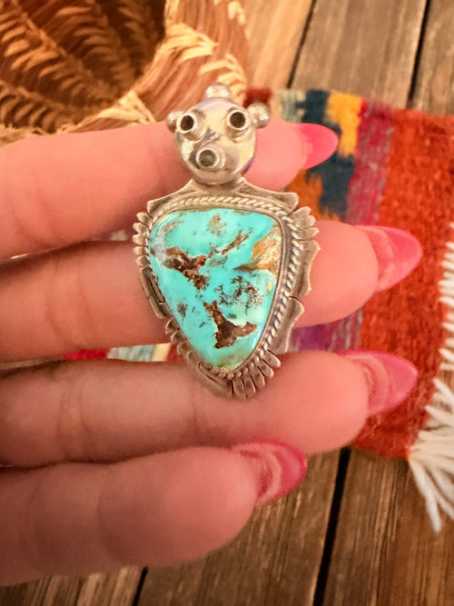 Old Pawn Handcrafted Turquoise and Sterling Silver Yei Symbol Brooch/ Pendant by Bennie Ration