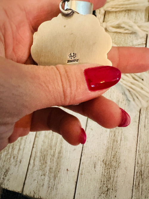 Handcrafted Sterling Silver and Coral Liberty Coin Pendant by Randy Boyd