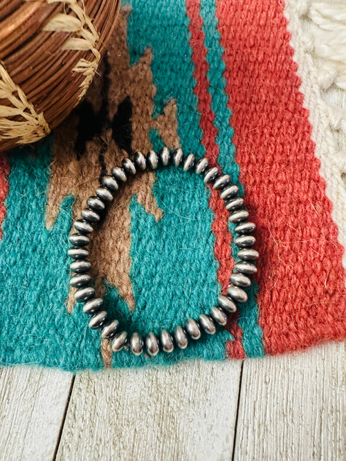 Handcrafted Sterling Silver Stretch 6mm Saucer Bead Bracelet