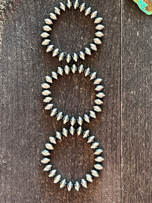 Vinita Cowboy Handcrafted Sterling Silver Stretch 10mm Saucer Bead Bracelets