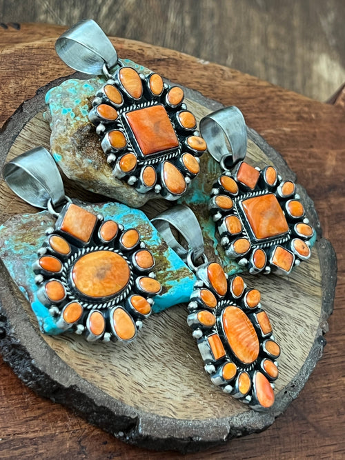 Handcrafted Sterling Silver and Burnt Spiny Oyster Shell Cluster Pendants by Loretta Delgarito