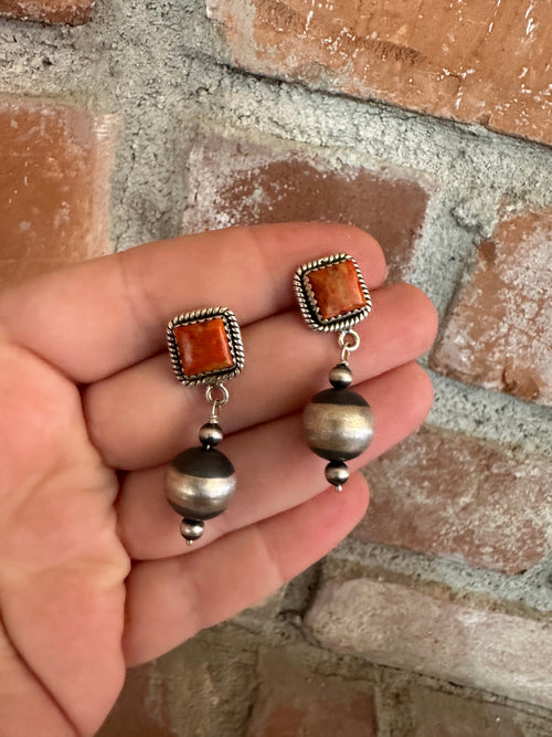 Nizhoni’s Handmade Sterling Silver Orange Mojave Navajo Pearl Style Dangle Earrings