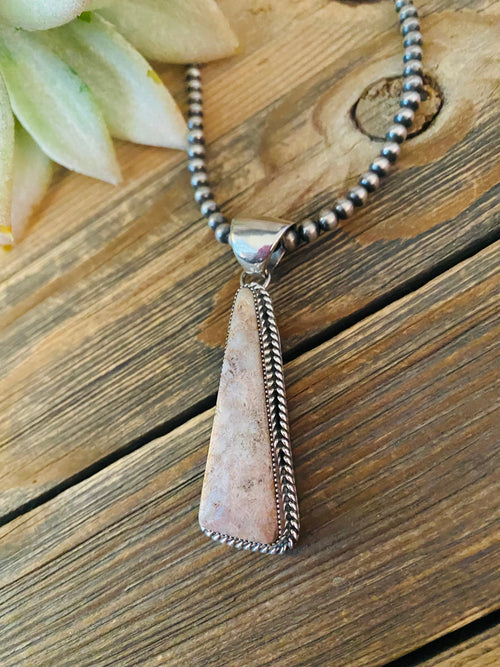 Navajo Sterling Silver & Fossilized Coral Pendant